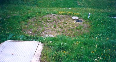 Station d'assainissement groupé. Assainissement rustique avec fosse septique toutes eaux, filtre pouzzolane et filtre à sable non étanche.